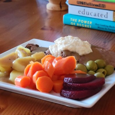 Beef pot roast with gravy, taters, and sweet carrots. Beet pickles, olives, and horseradish for garnish.