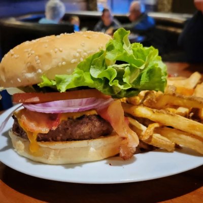 Eating at The Roadhouse in Strathmore. Great fries, mediocre burger, but great serving staff. Very redneck.