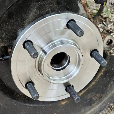 New rear bearing hub and the failed unit it replaced.