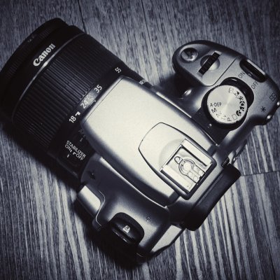 Used Canon EOS 350D with 18-55mm kit lens for $22 USD shipped. Works great.